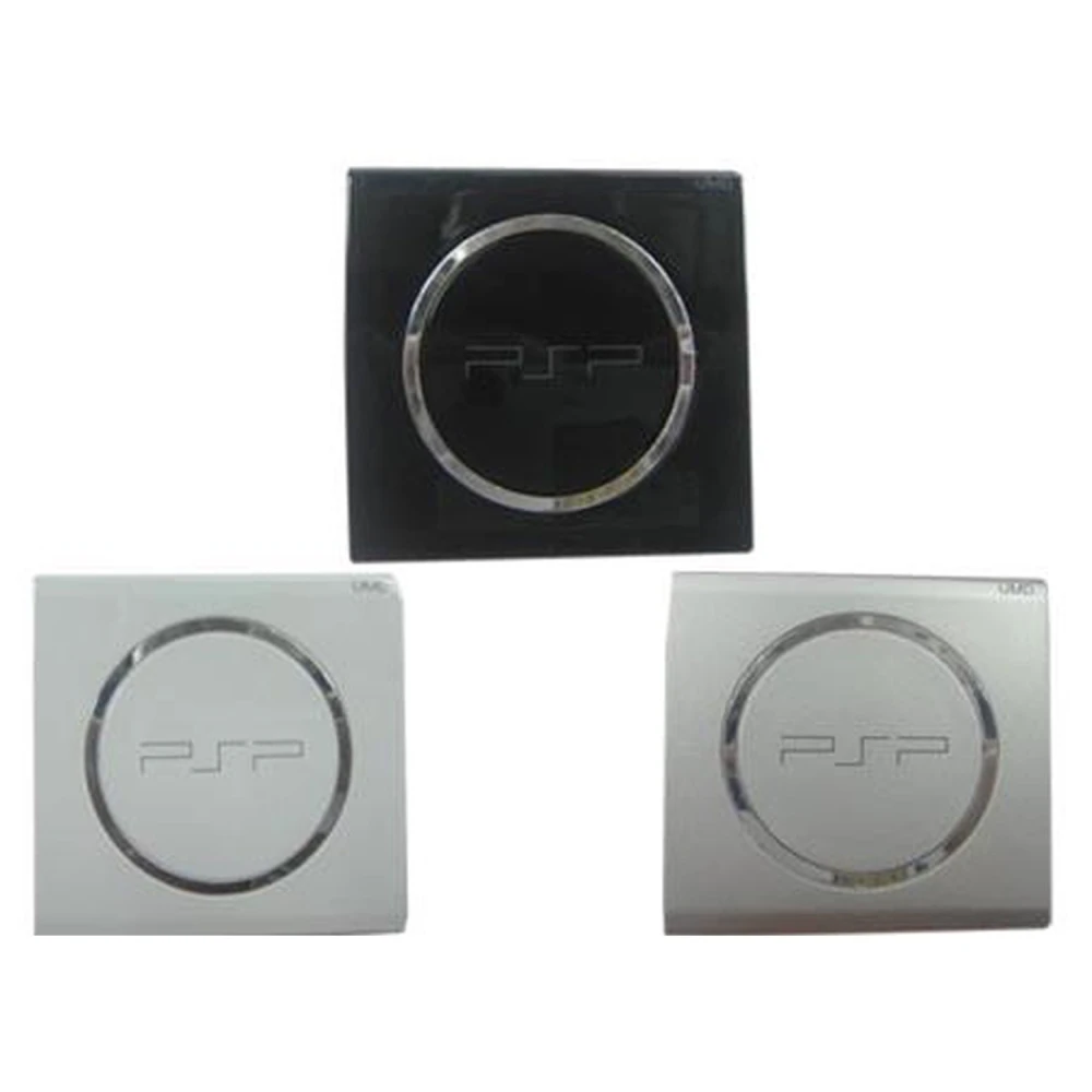 Tapa UMD de recanvi per a PSP 3000 disponible en negre, blanc i plata